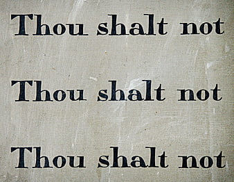Vintage 'Thou Shalt Not' Text on Aged Paper Background