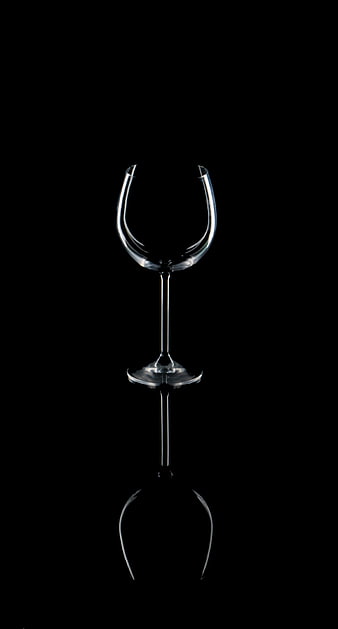 Elegant Empty Wine Glass with Reflection on Black Background