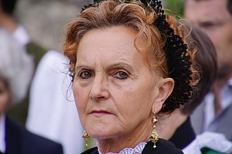 Portrait of elderly woman in traditional Tyrolean costume