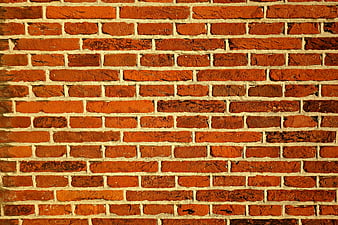 Textured Red Brick Wall Pattern Background