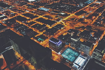 Aerial Night View of Chicago Cityscape with Glowing Streets