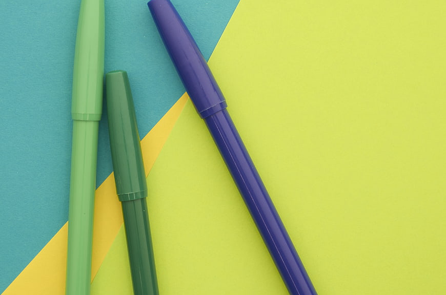 Colorful Markers on Geometric Background