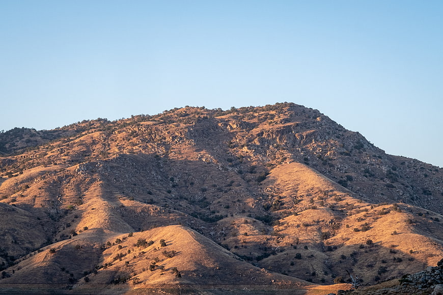 Golden Hour Sunlight on Dry Rocky Mountain Landscape