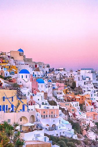 Santorini Sunset View with Blue Domes and White Buildings