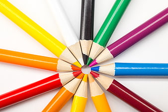 Colorful Pencils Arranged in a Circle on White Background