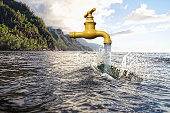 Conceptual Yellow Faucet Spilling Water Into Natural Lake Landscape