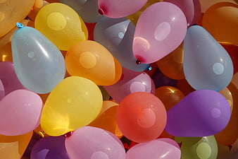 Close-up of colorful water balloons filled with water