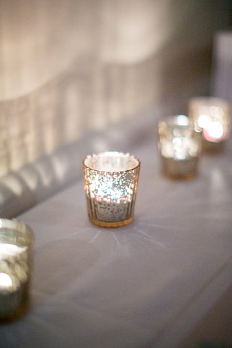 Elegant Glitter Candle Holders on White Tablecloth