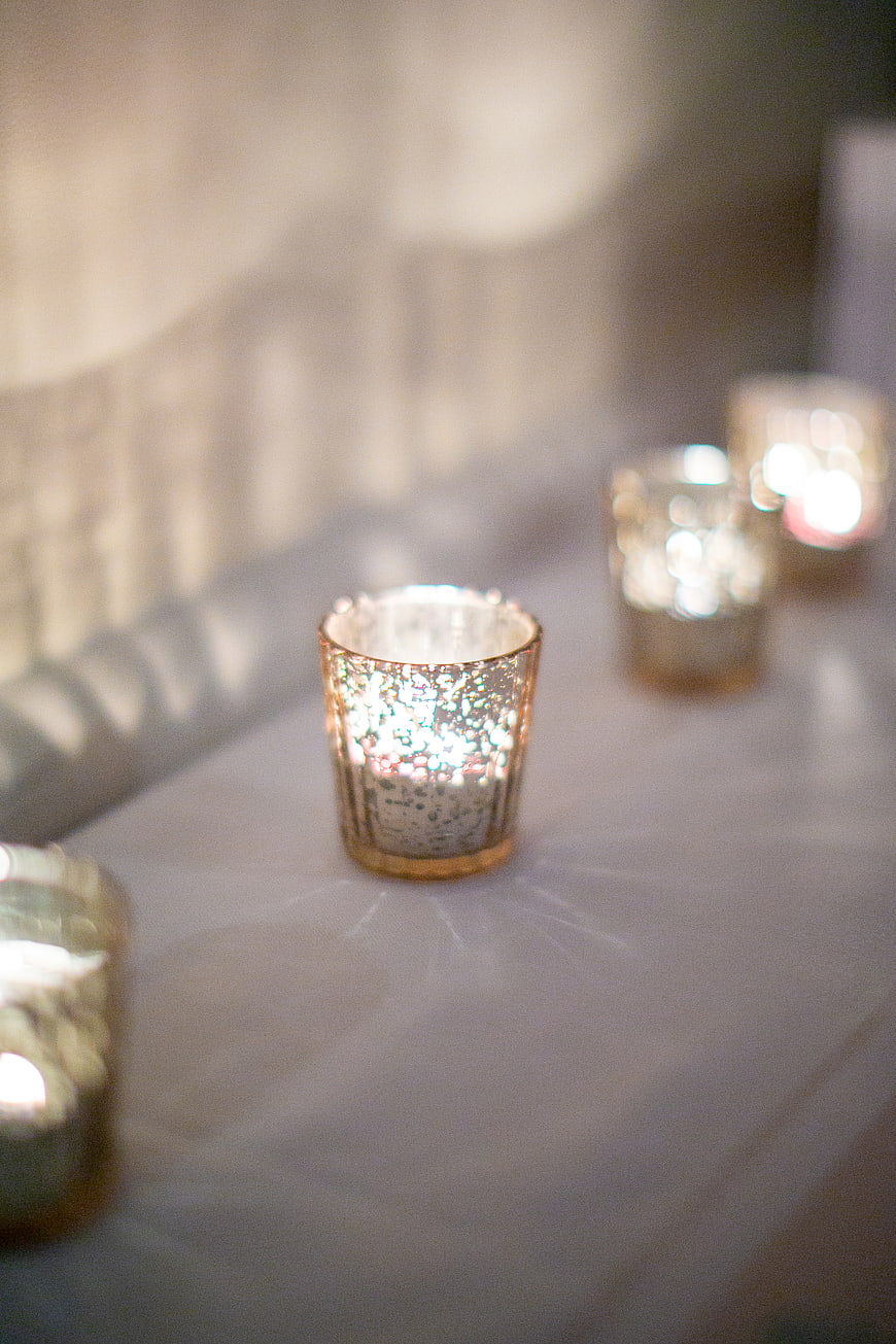 Elegant Glitter Candle Holders on White Tablecloth