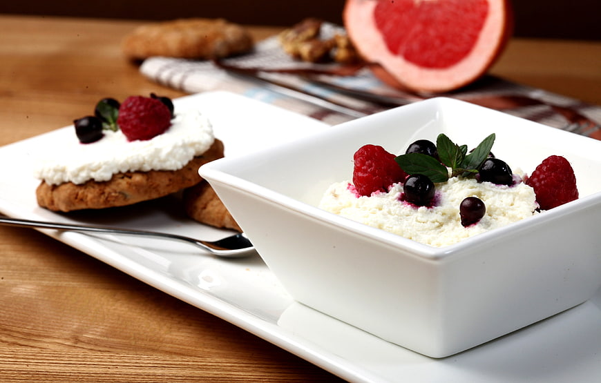 Healthy Breakfast With Cottage Cheese, Berries, And Baked Goods