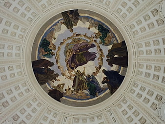 Ornate church dome ceiling with religious fresco painting
