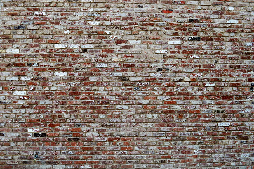 Weathered Red Brick Wall Texture Background