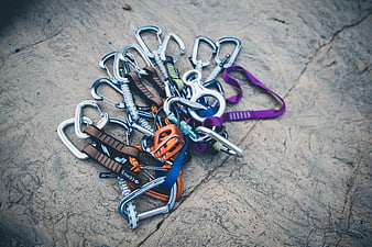 Climbing gear pile on rock surface