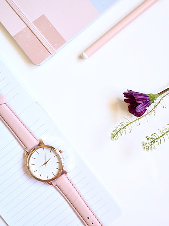 Minimalist Pink Watch Flat Lay with Journal and Purple Flower