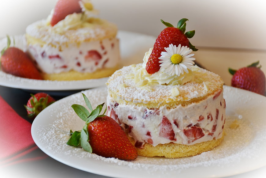Delicious Strawberry Shortcake with Cream and Daisy Garnish