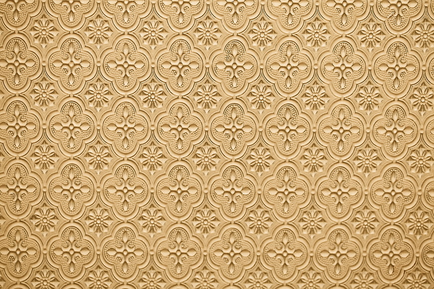 Beige embossed floral pattern texture background
