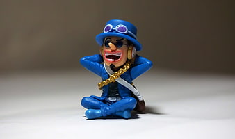 Blue One Piece Luffy Figurine Sitting Cross-Legged