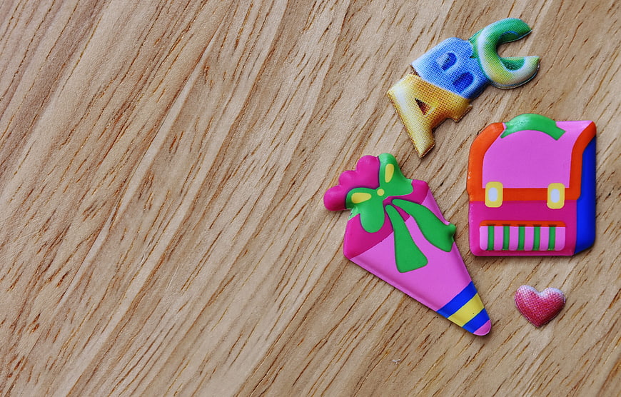 Colorful Clay School Supplies on Wooden Background