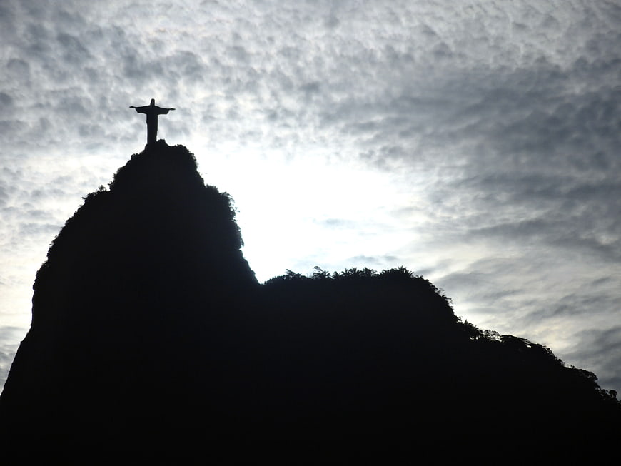 Christ the Redeemer Silhouette Against Dramatic Cloudy Sky in Rio de Janeiro