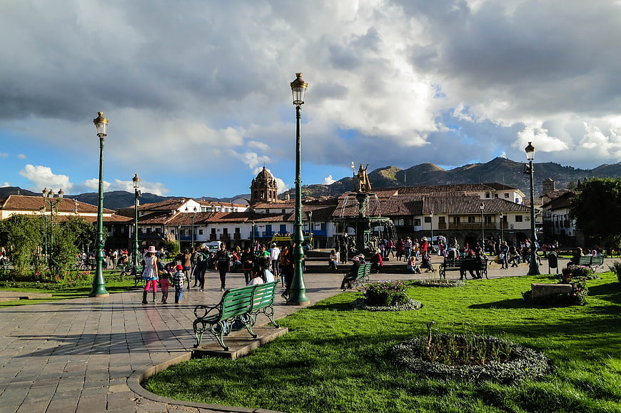 Plaza de Armas in Cusco, Peru with people and mountains