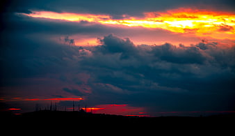Dramatic Sunset Sky with Dark Clouds and Silhouette