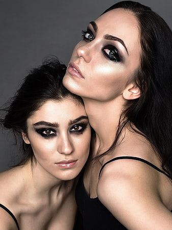 Two Women with Dramatic Smoky Eye Makeup Portrait