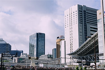 Urban cityscape with modern skyscrapers and train station