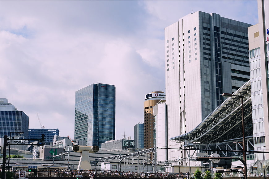Urban cityscape with modern skyscrapers and train station