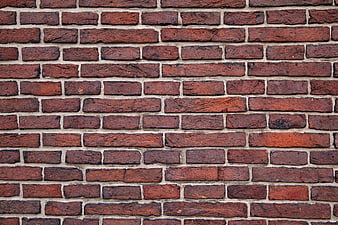 Textured Red Brick Wall Background Pattern