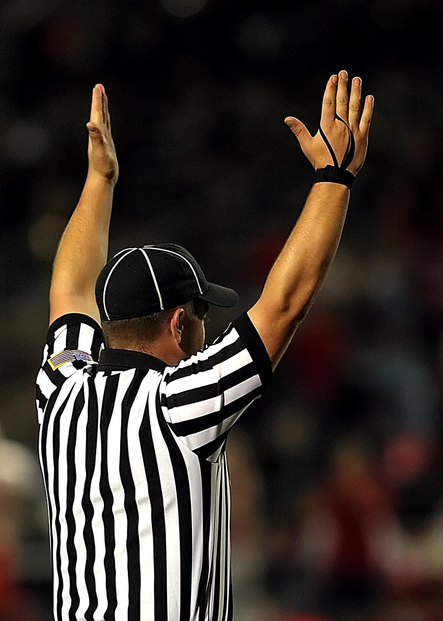 Referee Raising Hands Signaling Touchdown