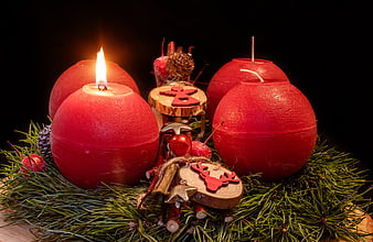 Red Advent Candles With Pine Sprigs And Wooden Christmas Ornaments