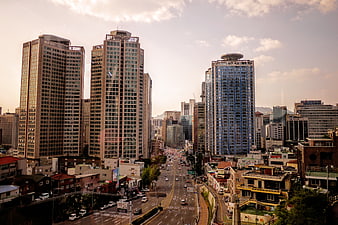 Urban Cityscape with Skyscrapers and Busy Highway Traffic
