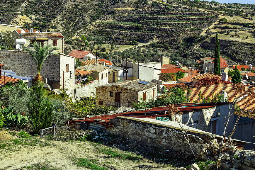 Traditional stone village with terracotta roofs in Cyprus hills