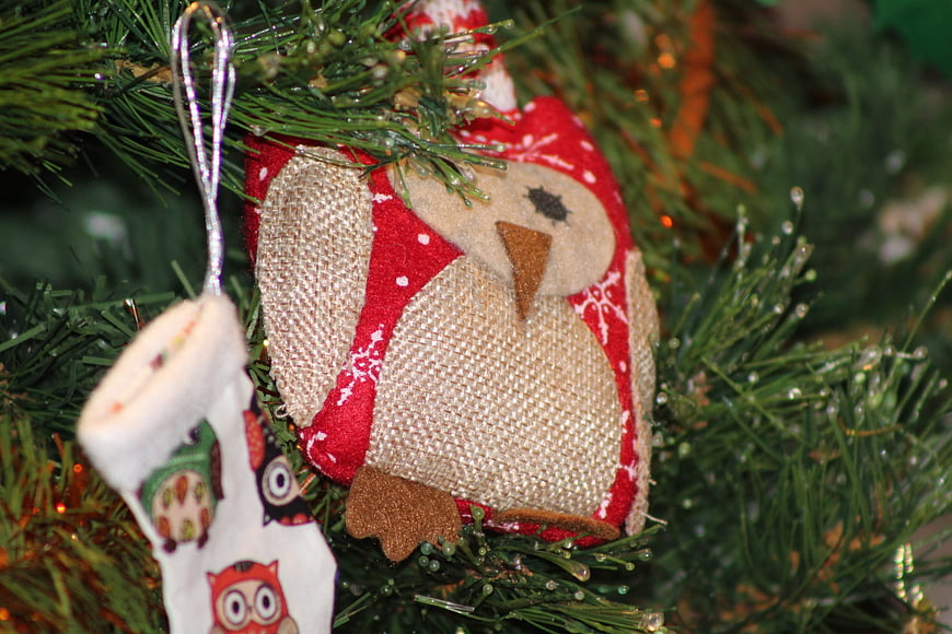 Rustic burlap owl Christmas ornament on pine tree