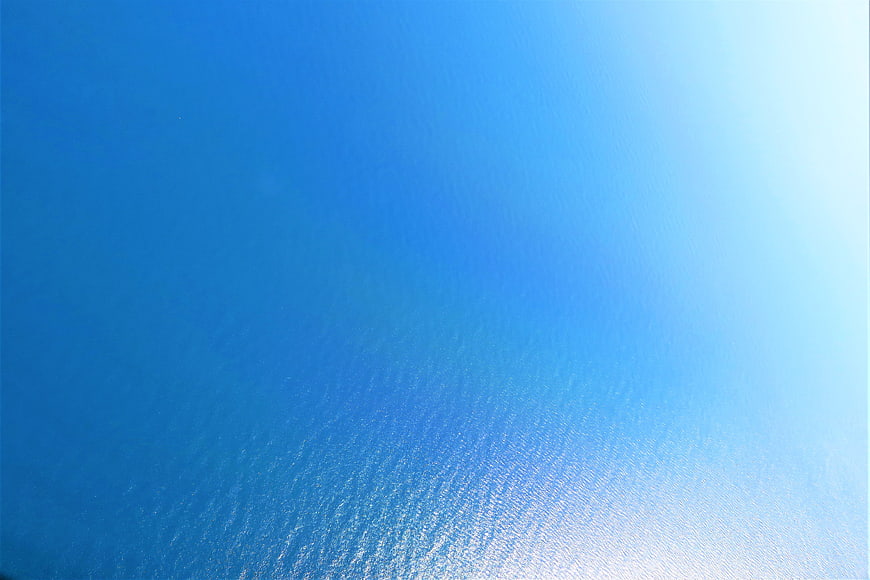 Aerial view of shimmering blue ocean water surface