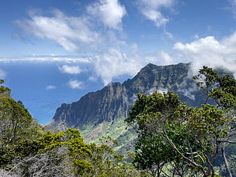 Dramatic tropical mountain ridge overlooking the ocean
