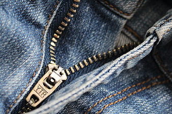 Close-up of Blue Denim Jeans Zipper Detail