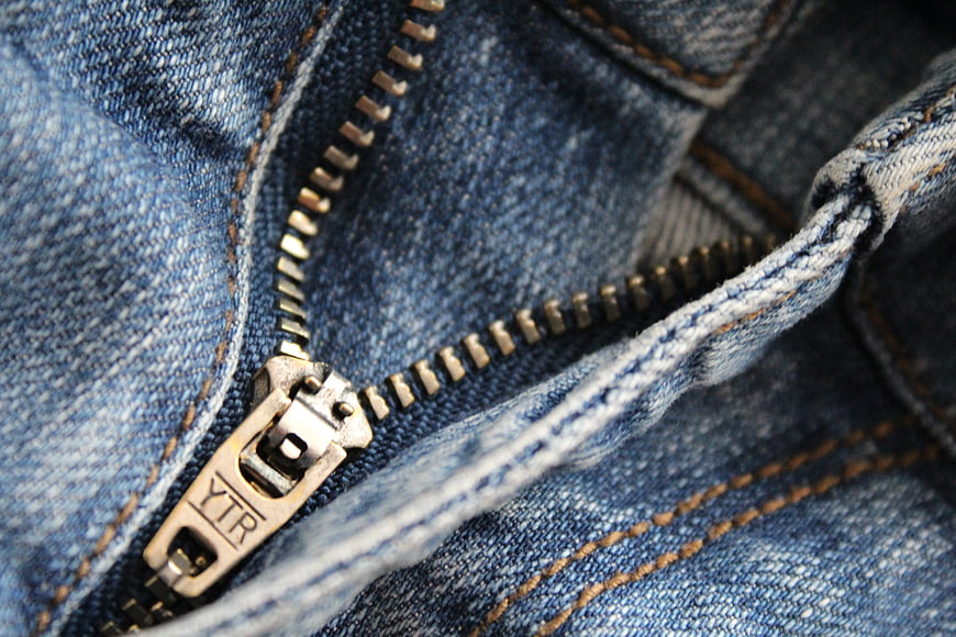 Close-up of Blue Denim Jeans Zipper Detail