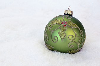 Green Glitter Christmas Ornament in Snow