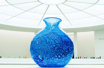 Textured Blue Glass Vase in Modern Museum Gallery