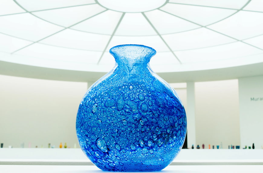 Textured Blue Glass Vase in Modern Museum Gallery