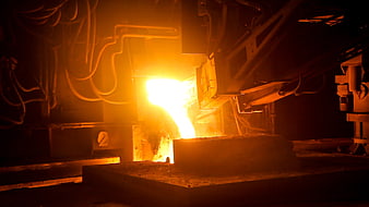 Industrial Molten Metal Pouring In Dark Factory