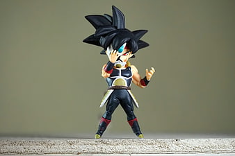 Dragon Ball Z Goku Black Chibi Action Figure on Textured Surface