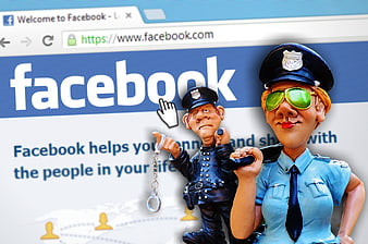 Police figurines guarding Facebook login page security