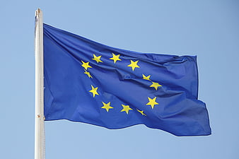 European Union Flag Waving Against Clear Blue Sky
