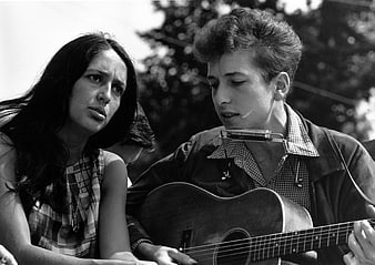Historical Black and White Photo of Bob Dylan and Joan Baez Performing