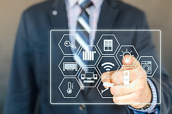 Businessman interacting with smart home technology interface