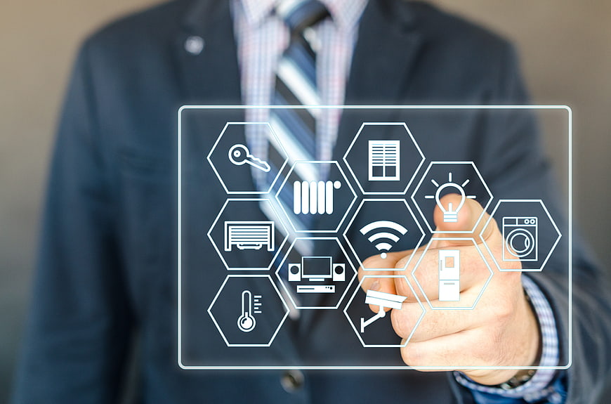 Businessman interacting with smart home technology interface