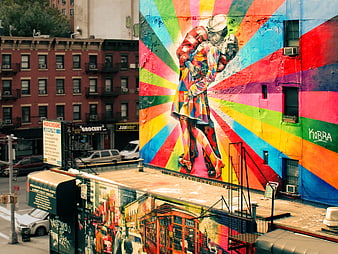 Vibrant Kobra Couple Mural on Urban Street Wall