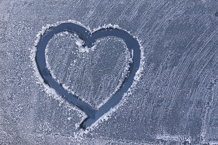 Heart Shape Drawn In Frosted Car Windshield Winter Background
